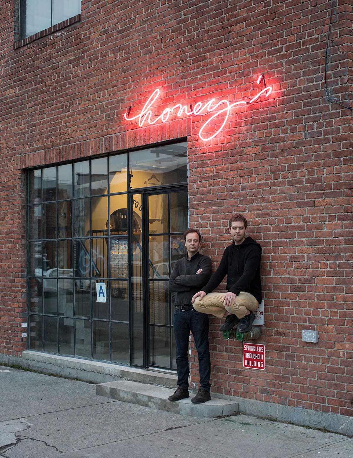 Raphael Lyon (left) and Arley Marks outside Honey's, the tasting room for Enlightenment Wines Meadery