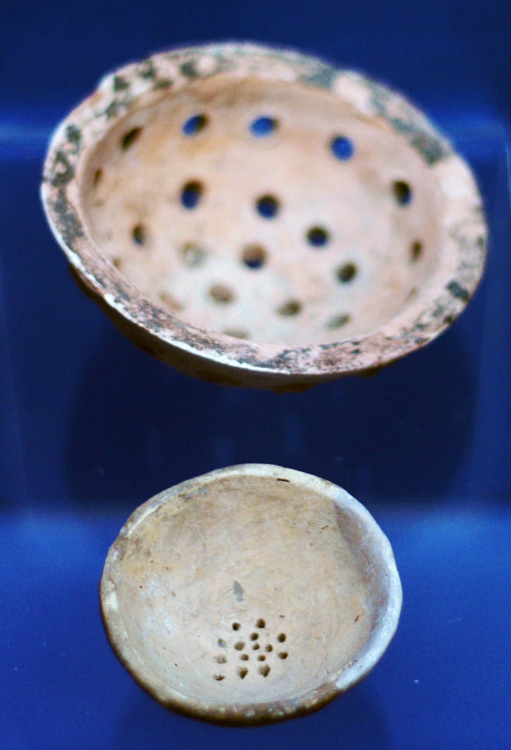 Clay sieves or strainers were used in beer preparation in ancient Iraq / Alamy
