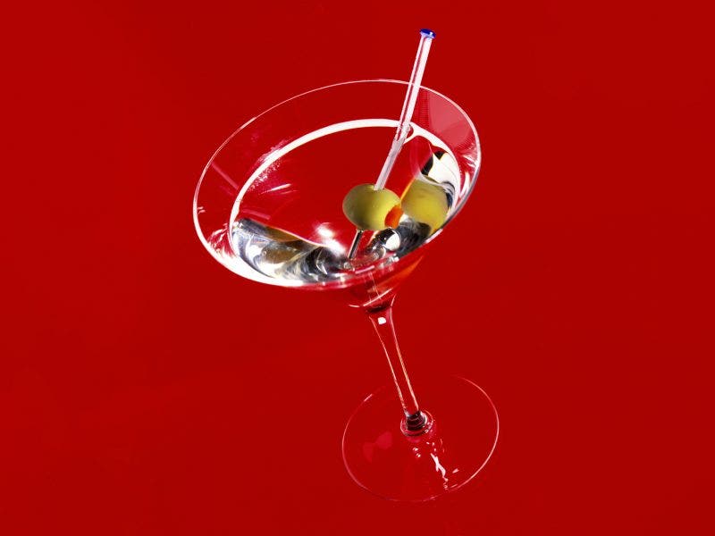 A classic martini on a red backdrop