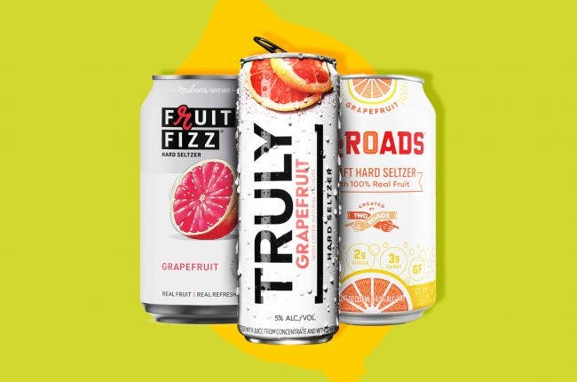 3 seltzer cans on a designed background